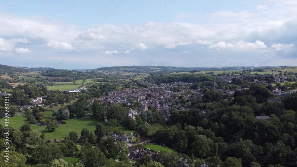 Bakewell, The Peak District, England - July 25 2023: Drone footage captures a panoramic view of the countryside surrounding Bakewell.