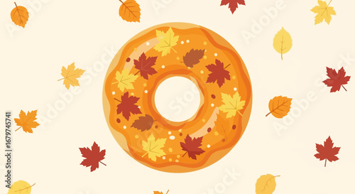 Autumn-themed donut design decorated with falling leaves and seasonal fall colors design