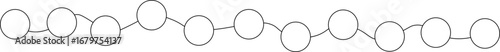 Ripple-shaped linear structure with evenly spaced circular elements following a wave-like formation.