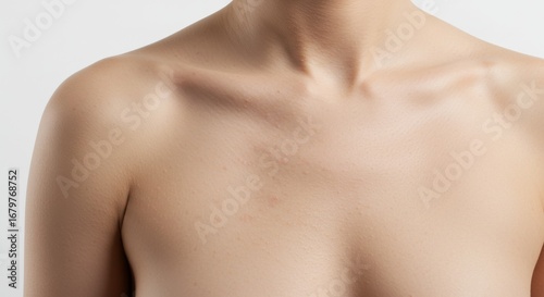 Bare Shoulders and Defined Clavicles in a Minimalist Anatomical Study.