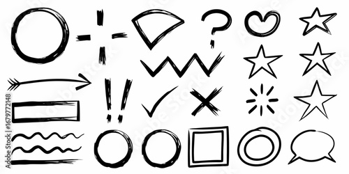 Collection of hand drawn black brush stroke symbols and shapes on white background