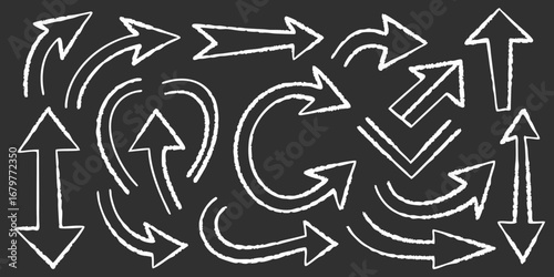 Collection of hand drawn chalk style arrows pointing in various directions on a dark background