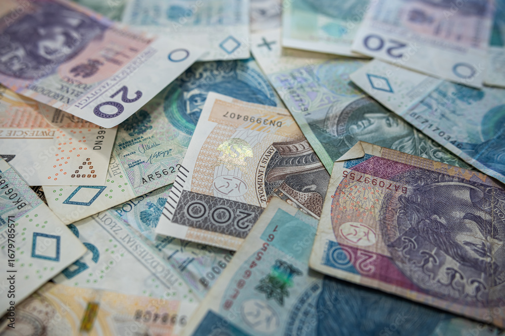 Fototapeta premium Polish Zloty Banknotes Background – Colorful Money Bills of Poland in Close-Up Macro