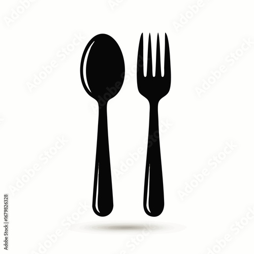 A black and white image of a spoon and a fork, commonly used as eating utensils.