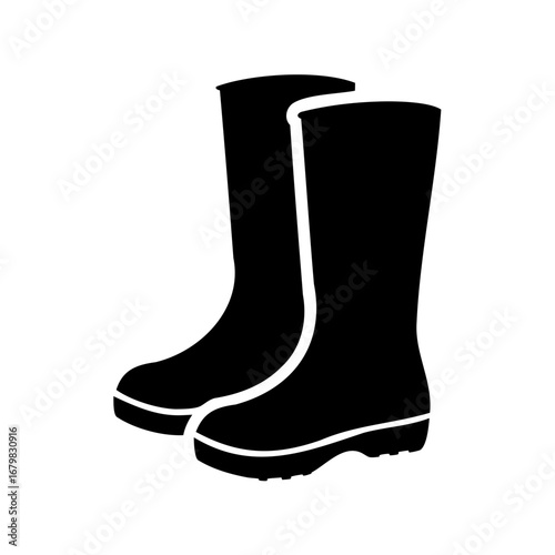 Two black rain boots with thick soles on a white background