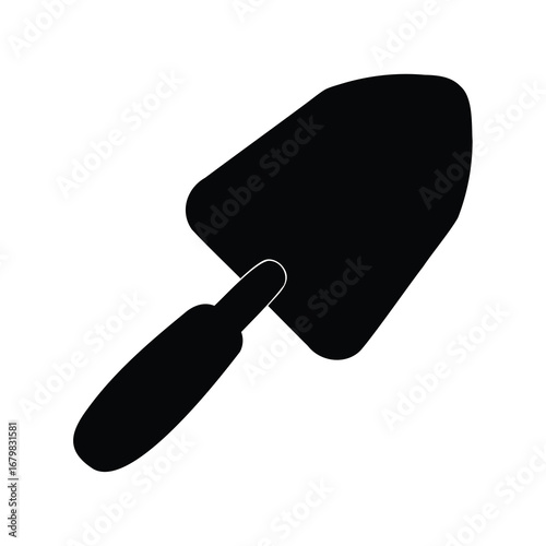 Simple black silhouette of a trowel used in gardening and construction work