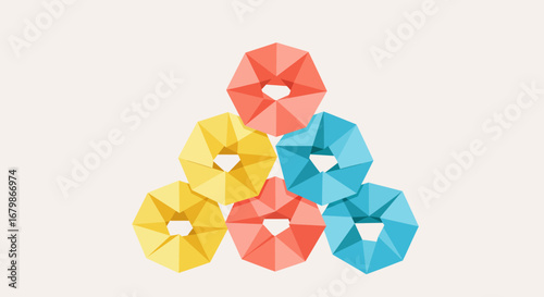 Stacked Geometric Doughnuts in Red Yellow and Blue.