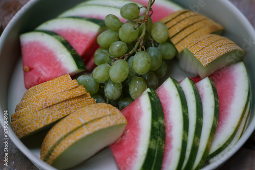 Fresh fruit on the plate. Close up. 