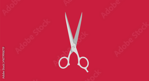 Sharp metal scissors with open blades ready for cutting.