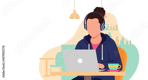 Young professional concentrating on laptop with headphones at a stylish cafe. Represents remote work, studying, or relaxed digital lifestyle.
