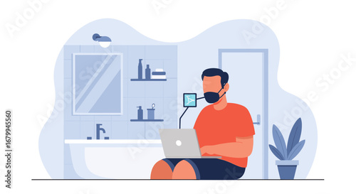 Man wearing a face mask works remotely on his laptop from an unconventional home office in the bathroom. Adapting to the new normal of telecommuting.