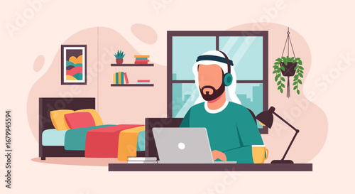 Focused Arab man wearing headphones works on a laptop at his desk in a modern home. Represents remote work, online learning, and digital business lifestyle.