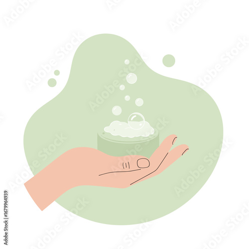 Minimalist flat design of a hand holding a soapy bar with bubbles. Hygiene and skincare concept.