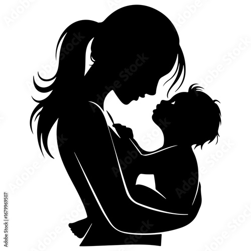 Silhouette of a mother lovingly holding and gazing at her infant child.