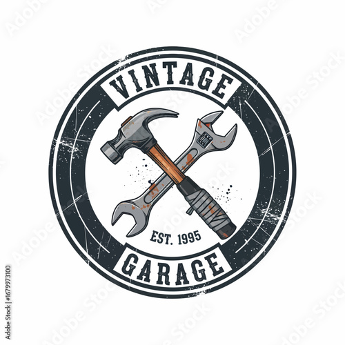 Vintage garage logo with a crossed hammer and adjustable wrench in a circular, distressed emblem.