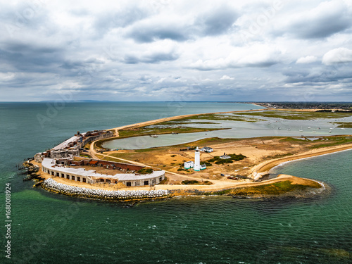 Hurst Point Lighthouse and Hurst Castle from drone over Hurst Spit, Milford on Sea, Lymington, Hampshire, England	
