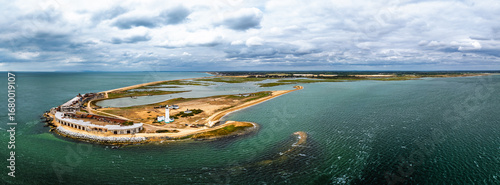 Panorama of Hurst Point Lighthouse and Hurst Castle from drone over Hurst Spit, Milford on Sea, Lymington, Hampshire, England	