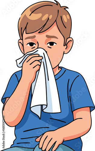 Sick young boy blowing his nose with a handkerchief.