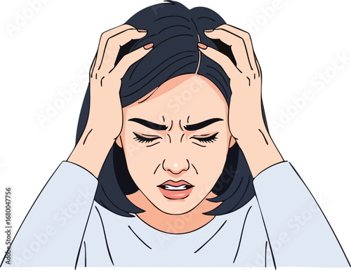 Stressed young woman holding her head in pain.