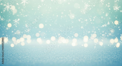 Winter wonderland background with snowflakes and glitter.
