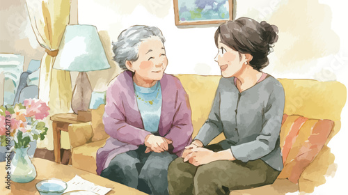 A friendly meeting takes place between a younger woman and an elderly lady, both smiling warmly while seated on a comfortable couch surrounded by homey decor.