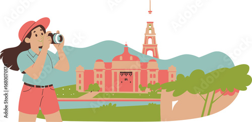 Woman photographing a landmark building and tower