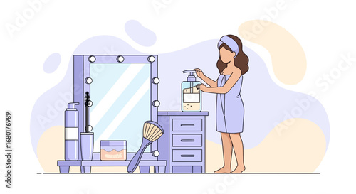Woman wrapped in towel applying lotion at her vanity table with makeup products