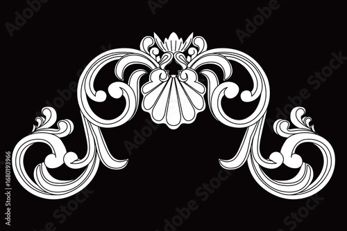 An ornate classic scroll ornament design features a beautiful central shell.