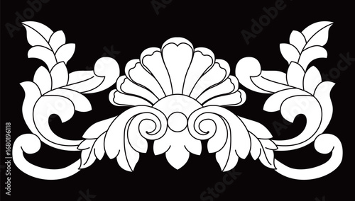 An elegant decorative scroll leaf pattern showing a classic ornamental design element.