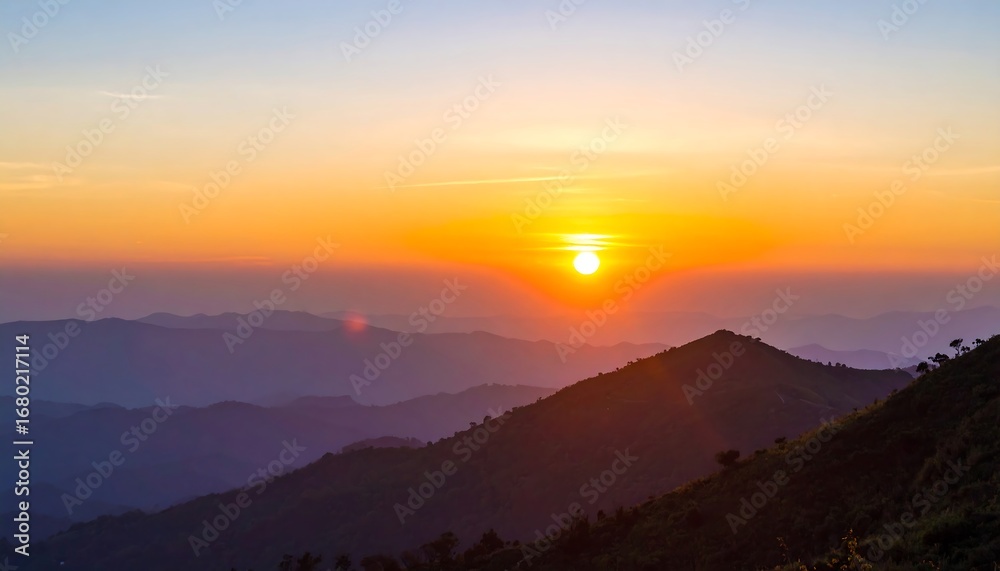 Obraz premium Sunrise over mountain ranges
