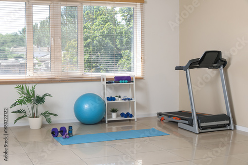 Interior of gym with shelf ...