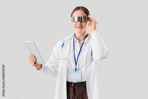 Female doctor in goggles wi...