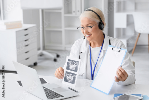 Female doctor with sonogram...