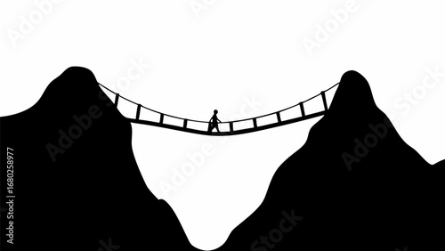 Silhouette of a person walking on a rope bridge between two mountains in a black and white landscape