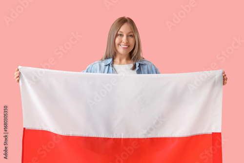 Young woman with flag of Po...