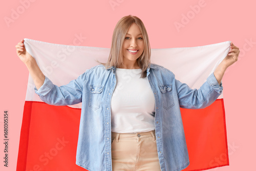 Young woman with flag of Po...
