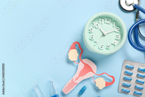 Clock with paper uterus and...