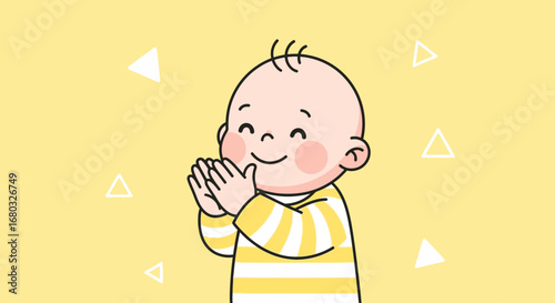 Affectionate Baby Joyfully Clapping Hands With Cheerful Expression On Yellow Background