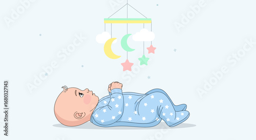 An adorable baby lying down and looking at a colorful hanging mobile toy