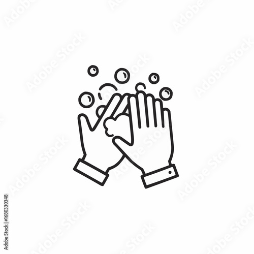 Hands washing with soap and water, bubbles indicating cleanliness.
