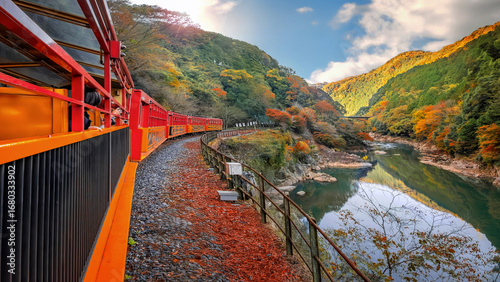 Kyoto, Japan - November 21 2024: Sagano Romantic Train with beautiful foliage in autumn in Kyoto, Japan