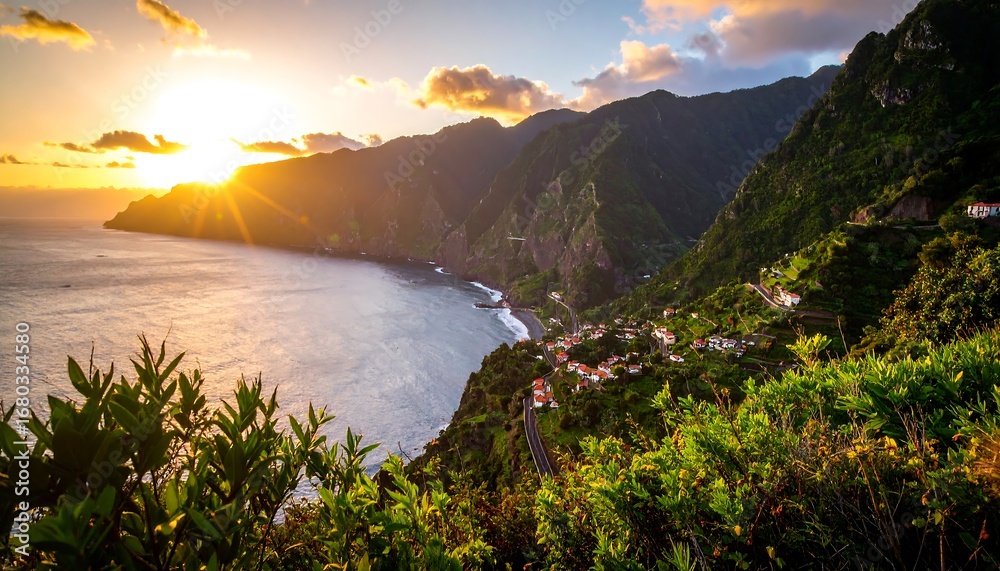 Obraz premium Dramatic sunset over a coastal town nestled in a mountainous valley
