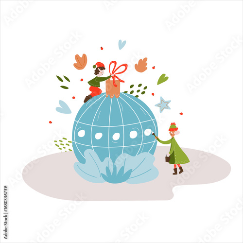 Two miniature elves decorate a Christmas tree decoration. Winter. New Year. Christmas. Christmas ball New Year's ball, Christmas 