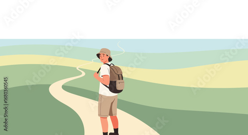 A young backpacker exploring a winding path through a beautiful landscape