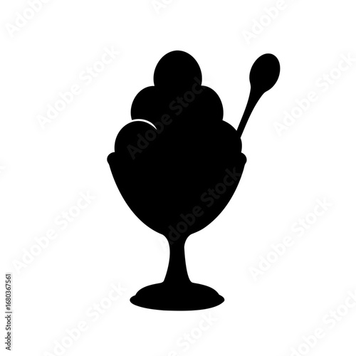 Silhouette of ice cream sundae with spoon ready for a sweet treat