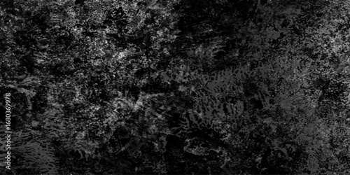 Abstract black grunge texture with dust grain and scratch patterns, dark concrete surface effect, distressed overlay background for vintage and cinematic style.