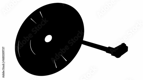 Silhouette of a black disc with a hole and lines connected to a rectangular shaped object viewed in perspective