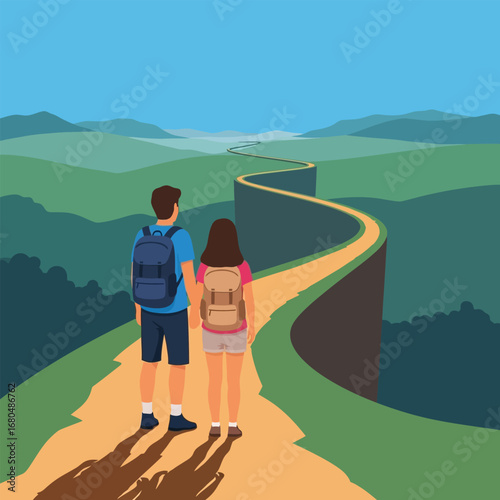 A couple with backpacks stands on a winding mountain path, gazing at a distant landscape.