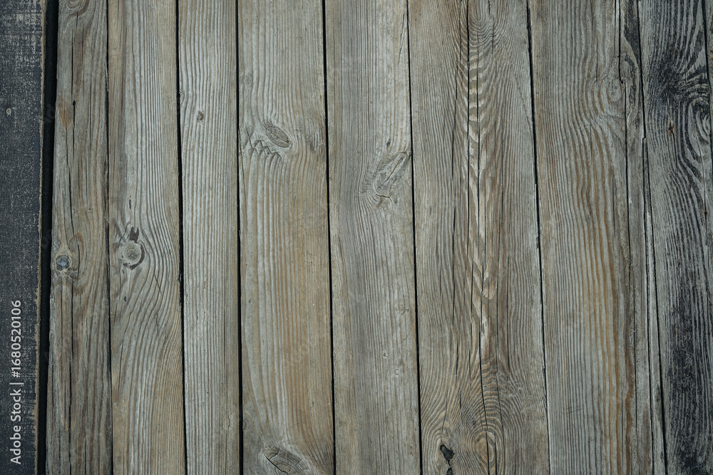 Naklejka premium Weathered wood planks surface, close up natural texture, vintage panel background, detailed grain pattern