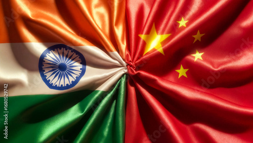 flags of china and india tied in a knot and lying next to each other, cooperation concept